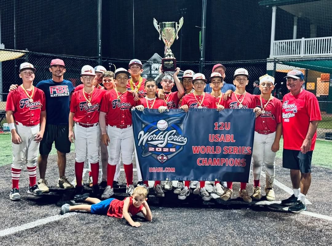 FB Braves players and coaches celebrating a tournament championship